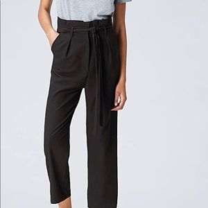 Paper bag style high waist pants. Never worn.